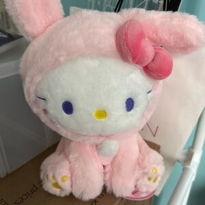 Soft Pink Plush Stuffed Animal with Embroidered Details